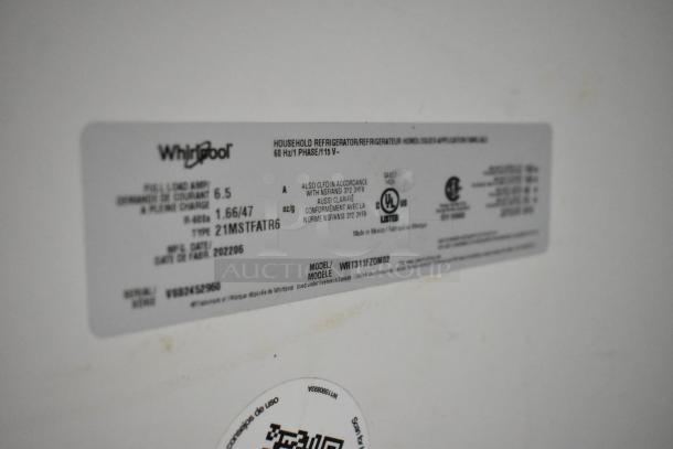Label on Whirlpool WRT311FZDM02 cooler, showing specifications: 115 volts, 1 phase, made in 2022, with compliance markings.