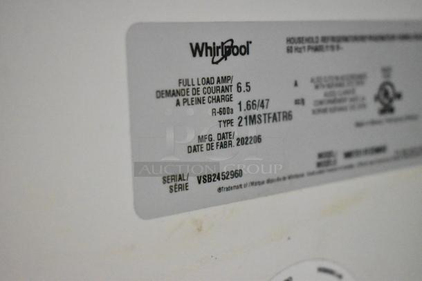 Label on 2022 Whirlpool WRT311FZDM02 stainless steel cooler with freezer. Shows model, serial number VSB2452960, and specs.