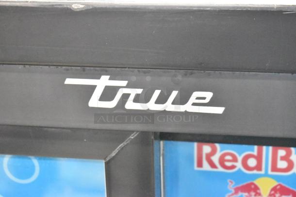 2018 True GDM-41SL-48-HC-LD cooler with dual glass doors; features poly-coated racks, 115V, and True logo visible.
