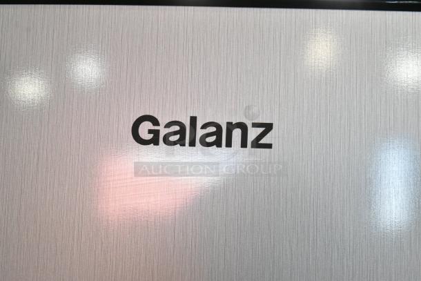 Galanz GLR31TS1E02 mini cooler with freezer, featuring 115 volts, 1 phase, silver finish, brand logo visible.