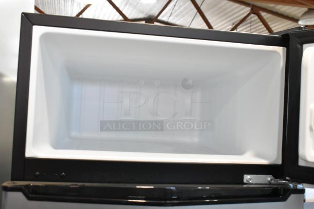 Galanz GLR31TS1E02 Mini Cooler with Freezer, open view. White interior, 115V, single phase. Model: GLR31TS1E02.