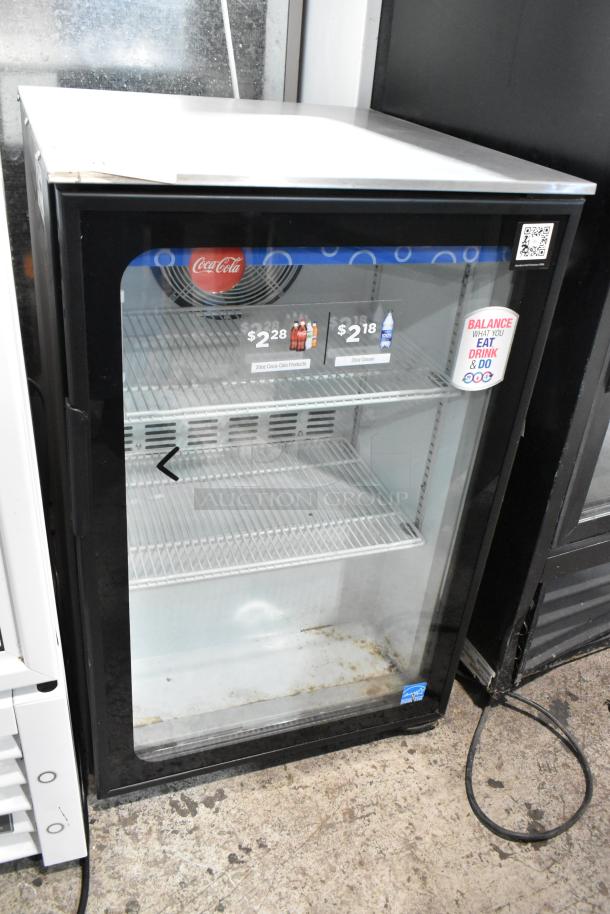 Imbera EVC04 metal mini cooler merchandiser, 115 volts, 1 phase. Features glass front and shelving, used condition, visible wear.
