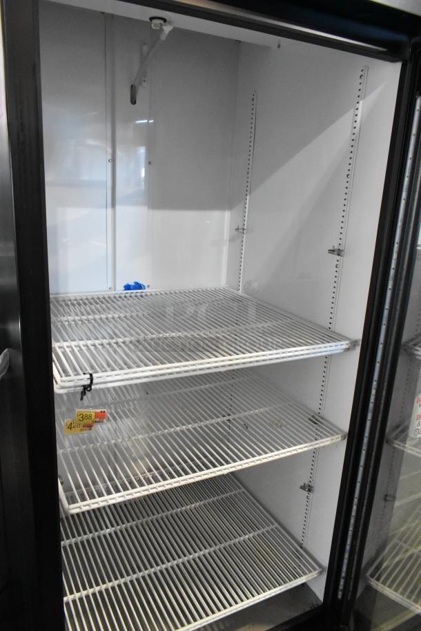2022 True GDM-26-HC commercial cooler, single door, metal, poly coated racks, 115V, 1 phase, internally clean, lightly used.