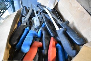 Box of 40 sharpened stainless steel knives, including fillet knife, with colorful handles. Used condition.