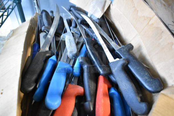 Box of 40 sharpened stainless steel knives with colored handles, including a fillet knife; used condition.