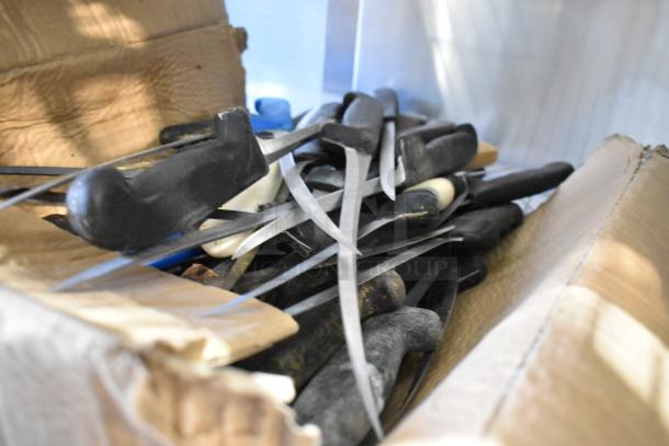 Box of 40 sharpened stainless steel knives, various types, including fillet knife. Black and white handles visible.