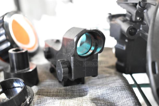 Celestron lot with eyepiece, various telescope pieces, and components. Items appear in used but good condition.