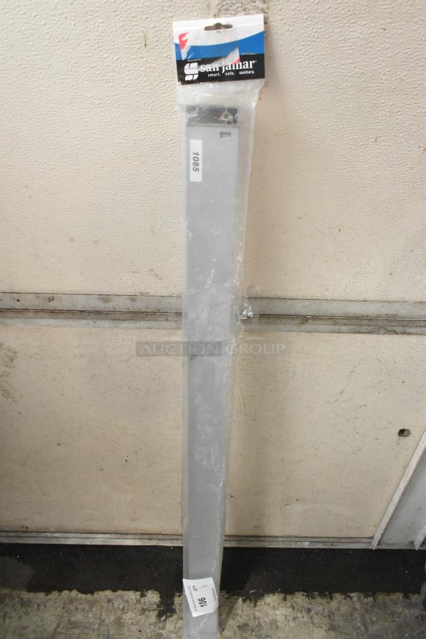 San Jamar CK6536A check holder rod, brand new with packaging, minor scratches. Label reads "1069".