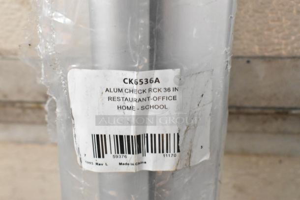 Brand new San Jamar CK6536A check holder rod, 36 inches, aluminum, minor scratches, for restaurant, office, home use.