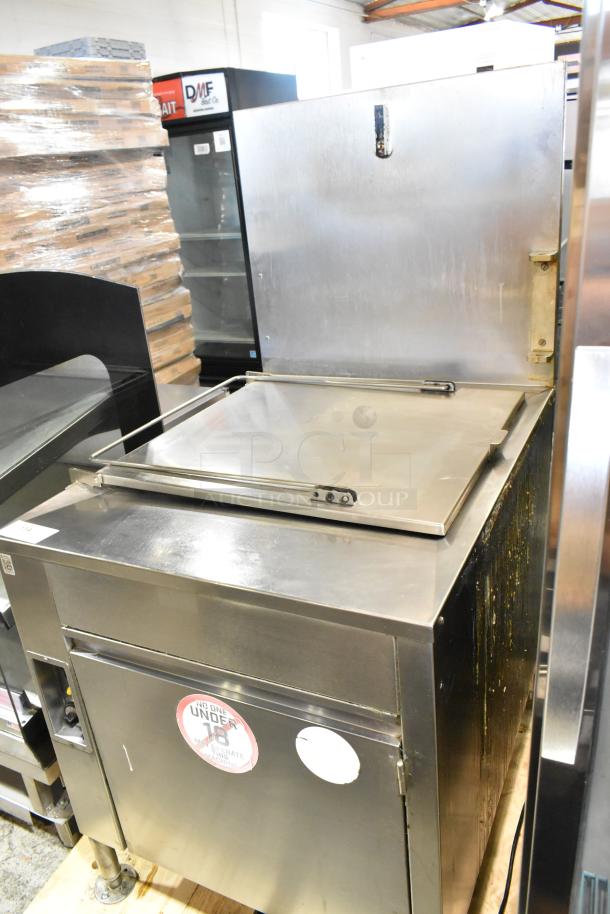 Avalon ADF24G-BA stainless steel commercial donut fryer, natural gas, 80,000 BTU, good condition, visible caution label.