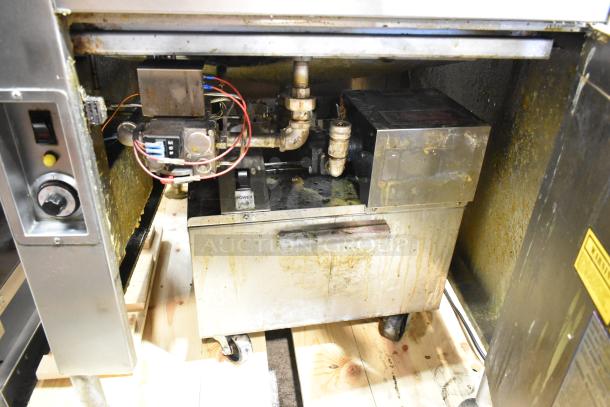 Avalon ADF24G-BA stainless steel commercial donut fryer, natural gas-powered, 80,000 BTU, used condition, visible controls.