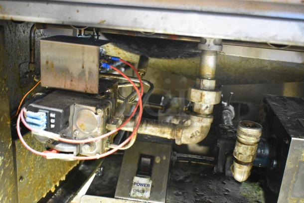 Avalon ADF24G-BA stainless steel commercial deep fryer, natural gas, 80,000 BTU, visible wiring and power switch.