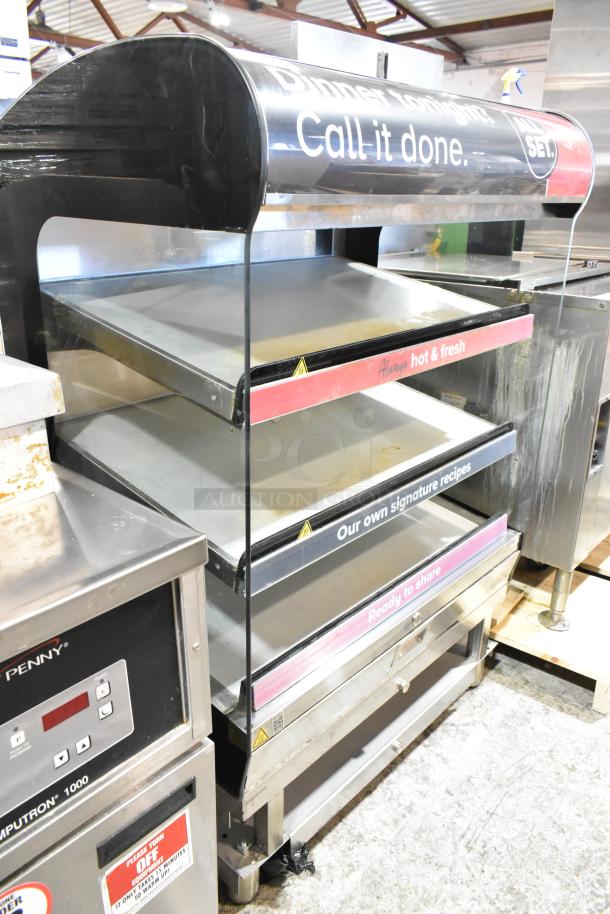 2023 Alto Shaam HSM-36/3S/T heated display case, metal, 3 shelves, well-maintained, 208-240V, 1 phase, commercial use.