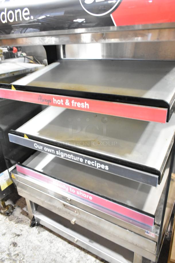 2023 Alto Shaam HSM-36/3S/T commercial heated display case with three shelves and "hot & fresh" label, great condition.