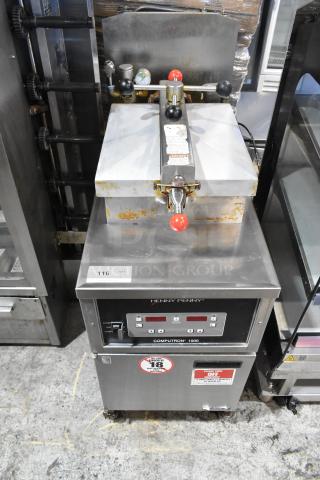 Henny Penny 600 Stainless Steel Commercial Floor Style Natural Gas Powered Pressure Fryer on Commercial Casters. 80,000 BTU. - Item #1205020