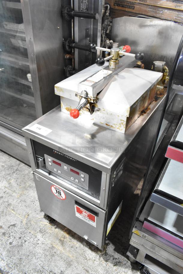 Henny Penny 600 stainless steel commercial pressure fryer with natural gas power, 80,000 BTU, on casters, visible control panel.
