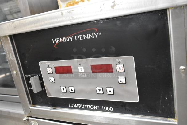 Henny Penny 600 natural gas pressure fryer, stainless steel, 80,000 BTU, on casters, features Computron 1000 controls.