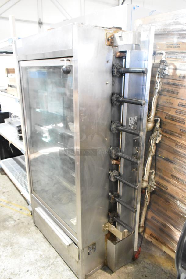 Old Hickory N/7G-RH metal commercial rotisserie oven, 7 spits, natural gas powered, stainless steel, good condition.