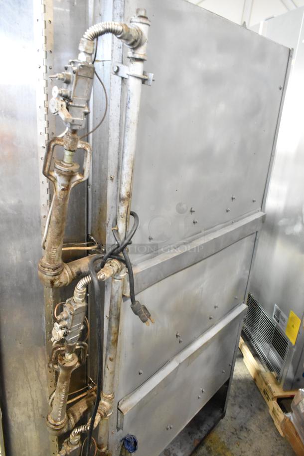 Old Hickory N/7G-RH metal commercial natural gas 7-spit rotisserie. Visible wear, attached wiring, and fittings evident.