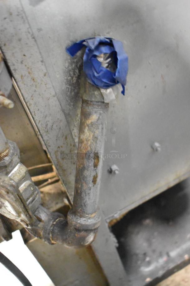 Old Hickory N/7G-RH rotisserie oven, metal, commercial floor style, natural gas, 7 spits, visible wear.