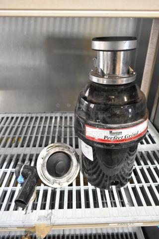 Mountain MT777BFWD Batch Feed Disposer, 115V, 1 Phase, black finish, perfect condition. Includes additional components.