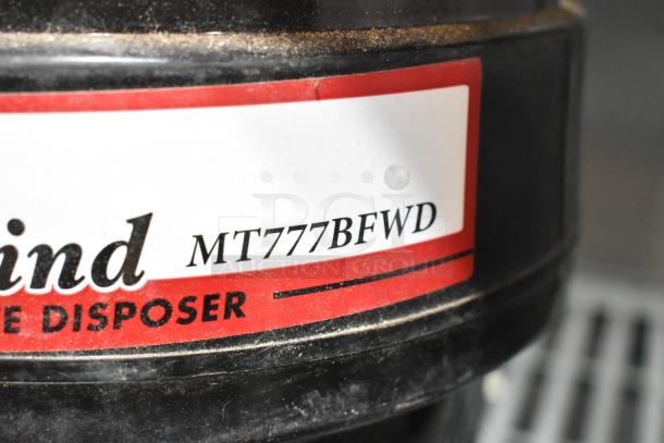 Mountain MT777BFWD Batch Feed Disposer, 115V, 1 Phase. Black unit with visible label, showing slight wear.