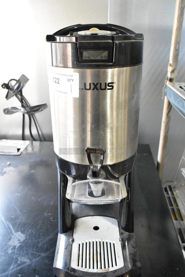 Fetco Luxus L4S-15 stainless steel beverage dispenser, with digital display and "Do Not Serve" spout. Good condition.
