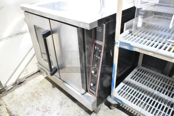 Garland Master 200 Stainless Steel Commercial Convection Oven, view-through door, solid door, metal racks, thermostatic controls.