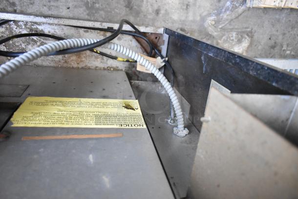 Garland Master 200 Stainless Steel Commercial Convection Oven, full size, view-through door, solid door, metal racks, thermostatic controls.