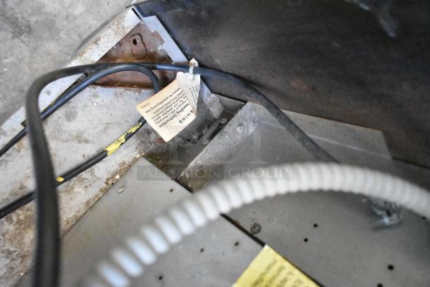 Electrical components and wiring detail of Garland Master 200 Stainless Steel Commercial Convection Oven. Tags display safety instructions.