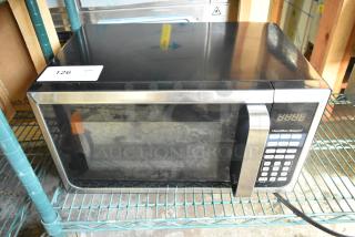Hamilton Beach P90D23AL-WR1 microwave oven with tray. Black and stainless design, keypad with digital display. 120 volts, 1 phase.