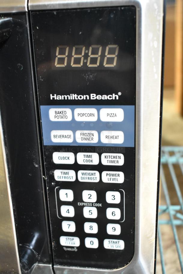 Hamilton Beach P90D23AL-WR1 microwave, digital display, button controls, good condition, 120V, 1 Phase.