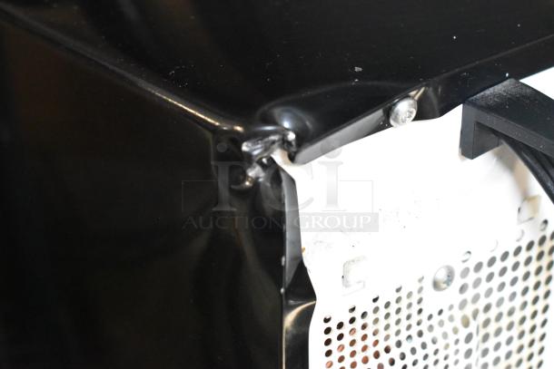 Hamilton Beach P90D23AL-WR1 microwave oven, 120V, visible exterior damage on corner.