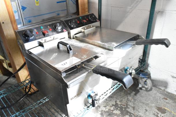 Rovsun EH102V electric 2-bay deep fryer with metal baskets and lids. 110V, 1 phase. Features dials and labels, excellent condition.