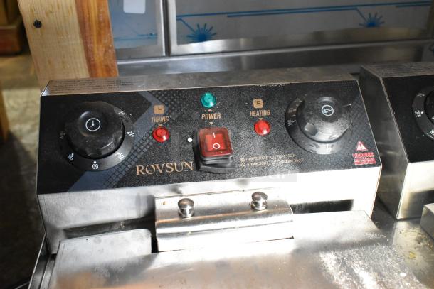 Rovsun EH102V electric fryer control panel with timing, power, and heating indicators. Includes operation dial and warning label.