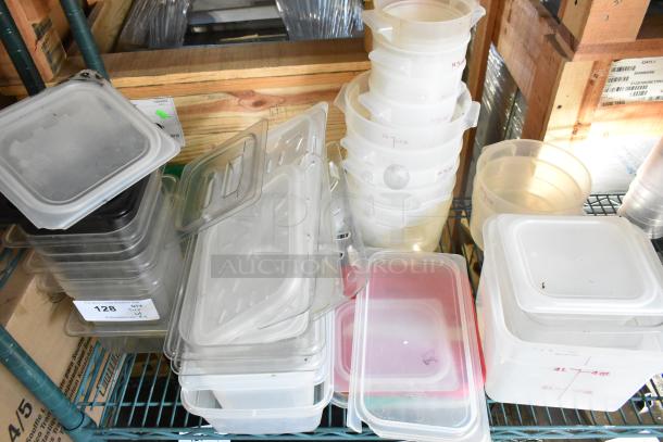 Two-tier lot featuring various poly bins, cutting boards, and fry baskets in mixed conditions, some labeled with measurements.