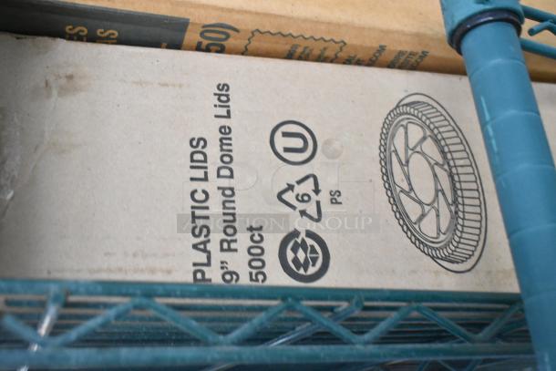 Auction lot including Dart P400N portion cups, 9" plastic lids, Companions PET lids, and 9" paper plates. No shelving included.