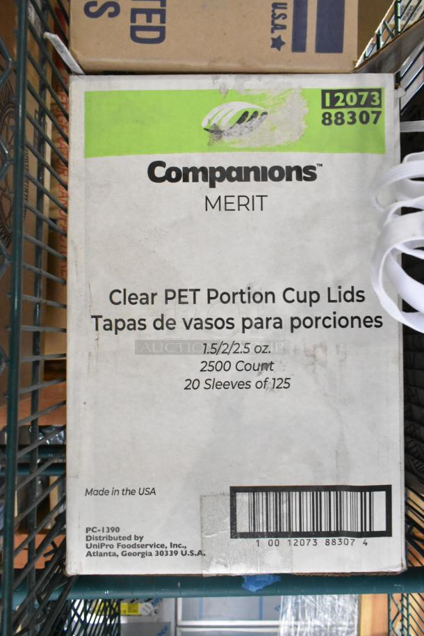 Box of Companions Clear PET Portion Cup Lids, 2500 count, 1.5/2/2.5 oz, 20 sleeves of 125. Made in the USA.