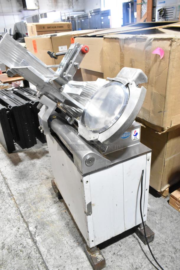 Fujee HFS-350S metal meat slicer, floor style, commercial use, 220V, visible branding, sturdy condition.