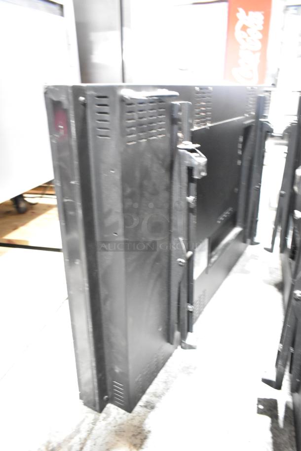 2017 Dongwoo XH100080-14001A Monitor, black, 220 Volts, 1 Phase, pickup only. Vertical view shows condition and mounting.