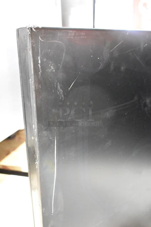 Two 2017 Dongwoo XH100080-14001A monitors, 220V, 1 phase, slight surface scratches, buyer pickup required.