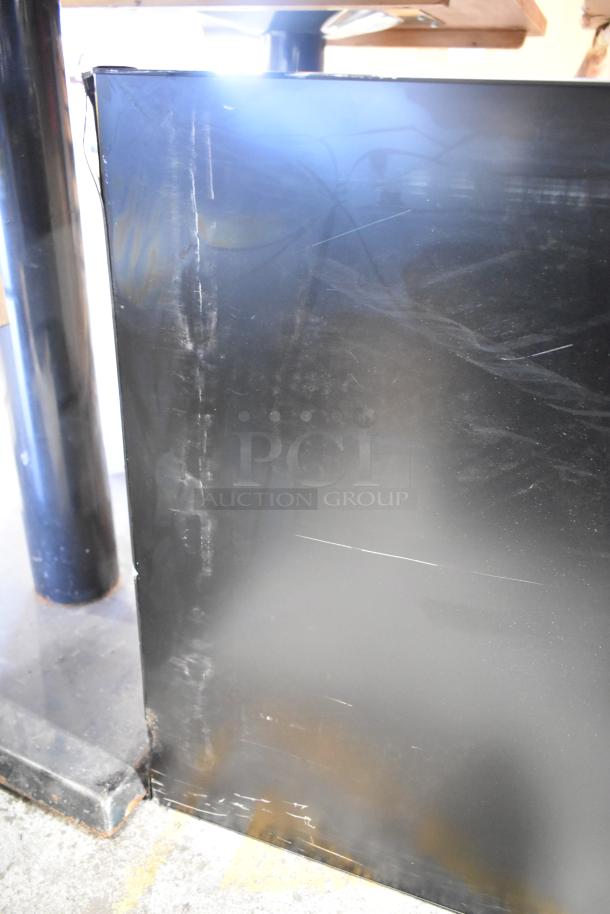 Two 2017 Dongwoo XH100080-14001A monitors, visible scratches, 220V, 1 Phase, pick-up only.