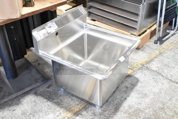 Brand new Steelton 522CS11818N stainless steel single bay sink, scratch and dent, no legs, visible tags and markings.