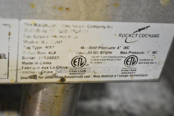 2022 Rocket Cooking stainless steel 2 burner range label, showing ETL certification, 50,000 BTU/Hr input, made in China.