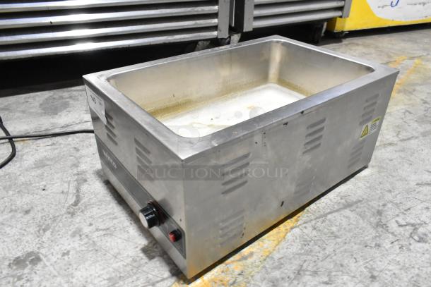 Winco FW-S600 stainless steel countertop electric food warmer, 120V, 1 phase, used condition with visible wear.