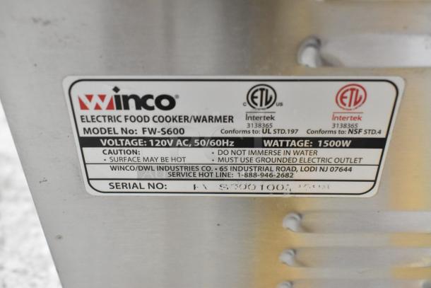 Winco FW-S600 food warmer label showing model, 120V, 1500W, ETL certified, and safety warnings. Stainless steel build.