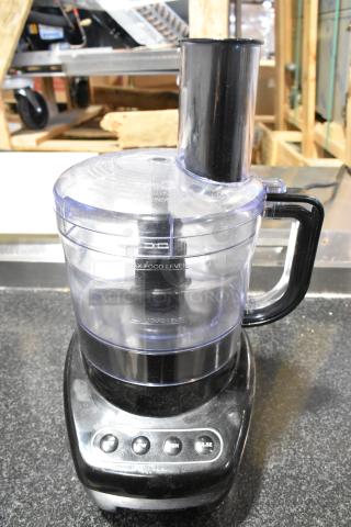 Spectrum FP4200 countertop food processor, 120V, 1 phase. Black base, clear bowl. Buttons for low, high, pulse settings.