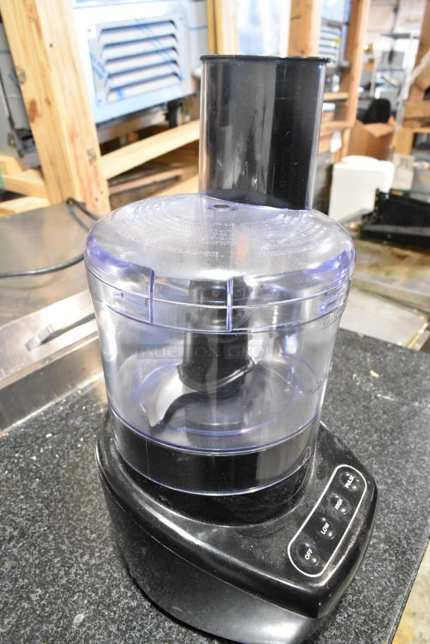 Spectrum FP4200 food processor, black base, clear bowl, 120V, 1 phase. Good condition with multi-speed controls.