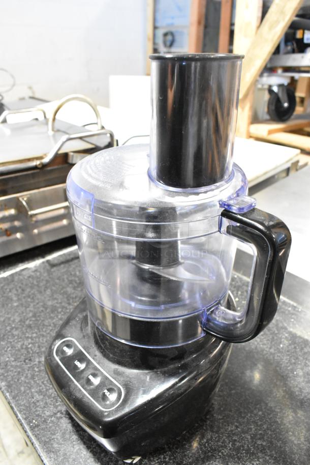 Spectrum FP4200 countertop food processor, 120 volts, 1 phase. Features a black base, clear bowl, and control buttons on the front.