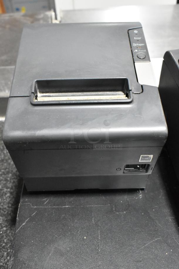 Lot of 4 items: 3 Epson receipt printers, 1 metal cash drawer. Model 721350. Used condition, signs of wear.